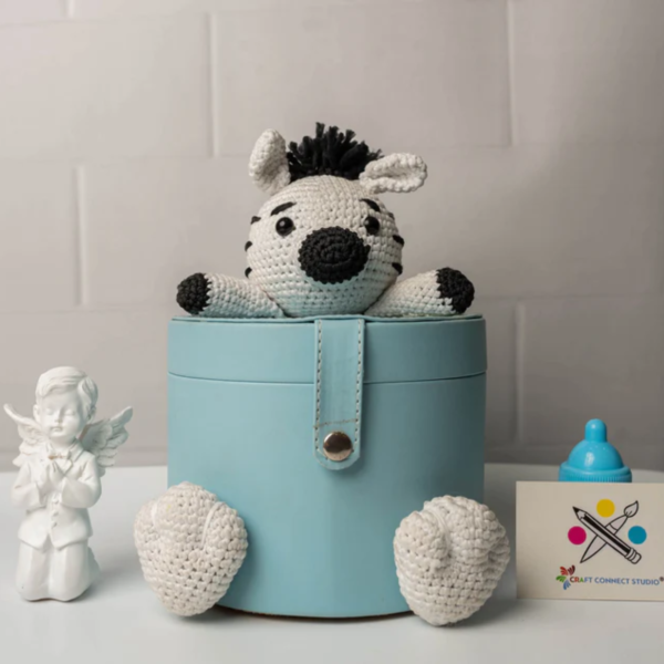 Baby Blue Leatherite Boxes on Crochet Toys