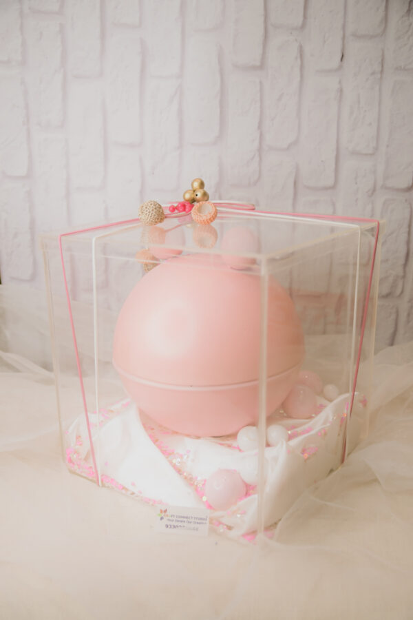 Pink Metal Jar under Acrylic Box